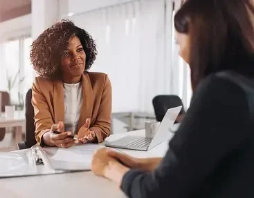 A therapist provides compassionate guidance to a client during an individual DBT therapy session.
